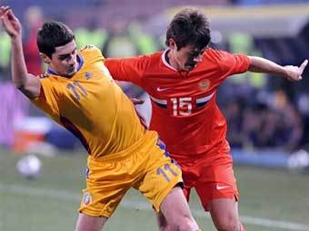 Эпизод матча Румыния - Россия. Фото AFP Эпизод матча Румыния - Россия. Фото AFP