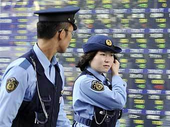 Токийская полиция. Фото AFP Токийская полиция. Фото AFP